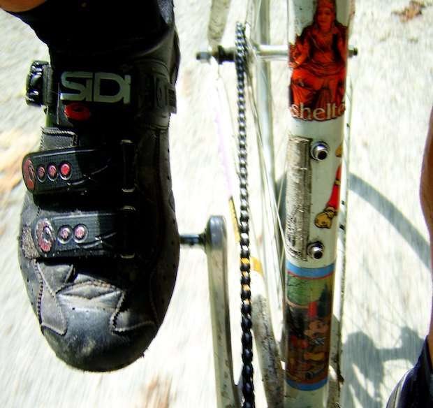 Close up of a cycling shoe clipped in to a pedal