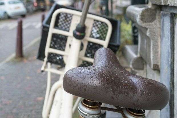 Wet bike seat that requires gear for cycling in the rain