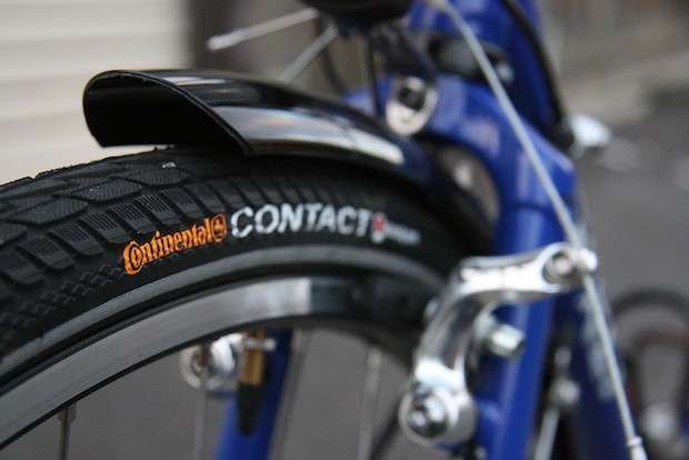 11 Ways To Make a Hybrid Bike Go Faster Than a Road Bike Close up of hybrid bike tire purchased after rider learned how to improve a hybrid bike