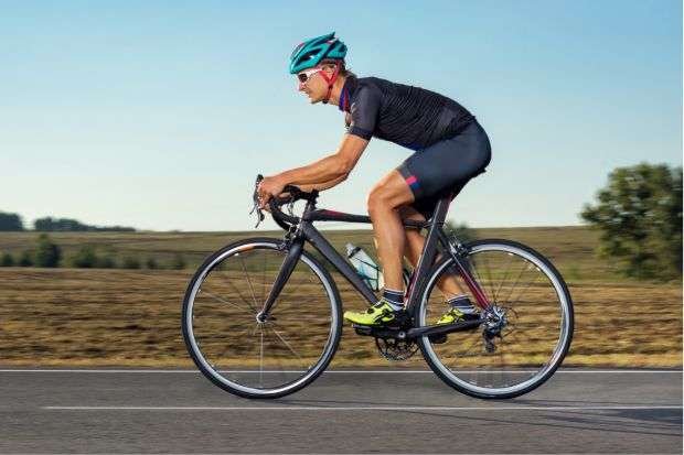 10 Bicycle Seats That Protect the Perineum Man riding bike with seat that protects the perineum